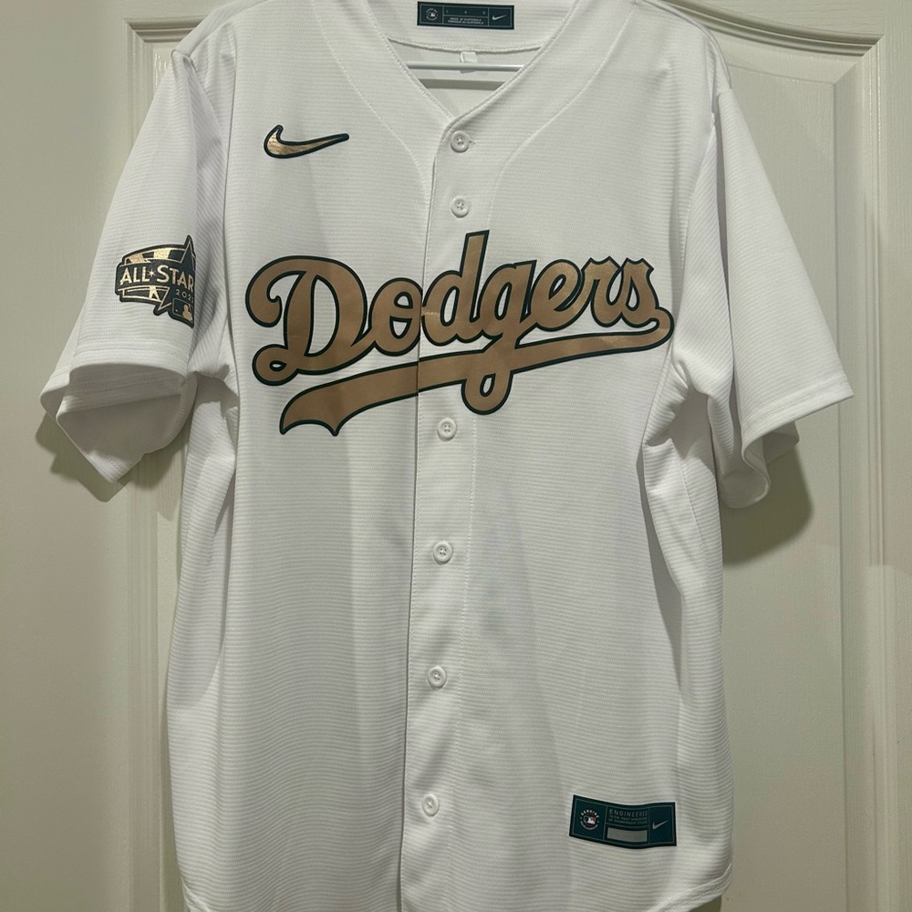 Nike White Jersey with Gold and Black Patch